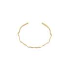 Alaya Small Wave Cuff bracelet. Gold plated. Dansk Copenhagen