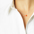 Sign necklace with pendant. Neon orange. Sterling silver. Scherning Copenhagen