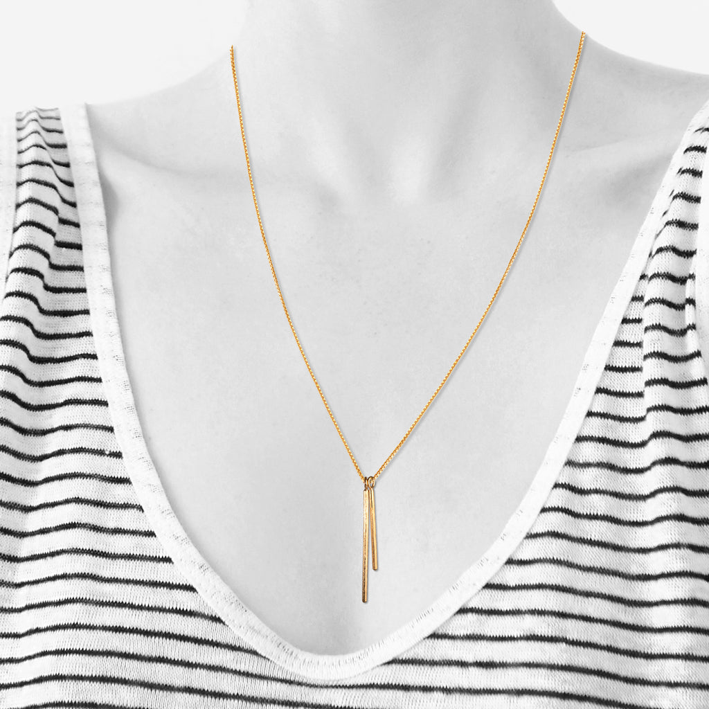 Lee dangle duo necklace. Gold-plated sterling silver. Scherning Copenhagen